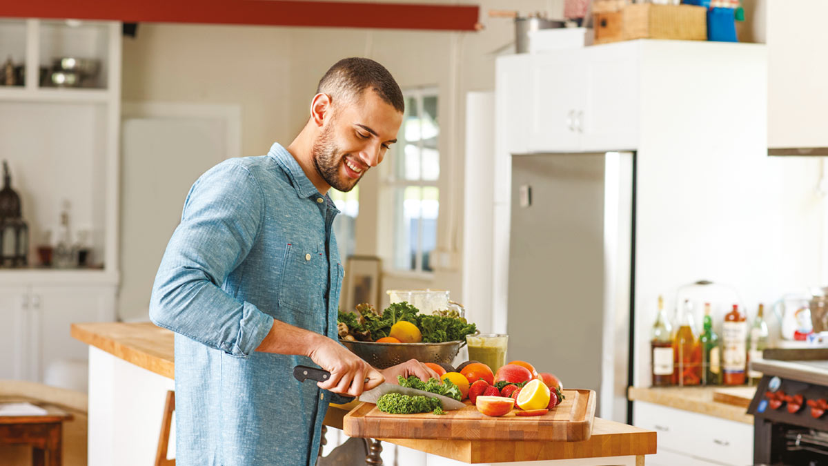 Man cooking healthy food